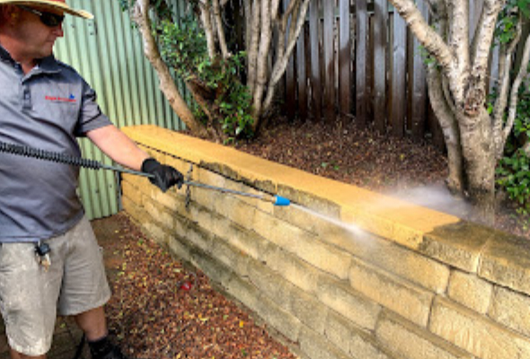 Pressure Cleaning a Sandstone Retaining Wall